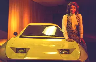 Elizabeth Carmichael poses with a prototype of The Dale. (Photo: HBO)