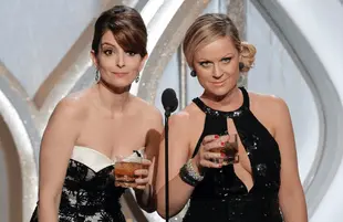 Tina Fey and Amy Poehler host the Golden Globe Awards. (Photo: Paul Drinkwater/NBC)