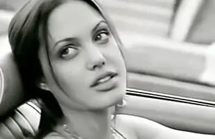 Angelina Jolie in The Lemonheads' video for "It's About Time."