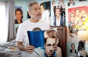 Superfan George Clooney shows off his Brad Pitt shrine in new ad (Photo: YouTube)