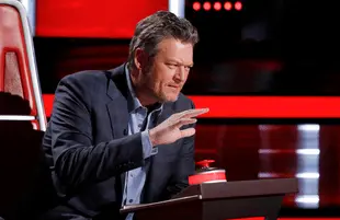 Blake Shelton accidentally bit the hand that feeds him Monday on The Voice (Photo: NBC)