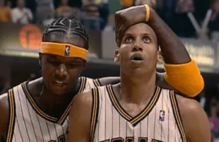 Jermaine O'Neal and Reggie Miller of the Indiana Pacers in an image from Untold: Malice at the Palace. (Netflix) 