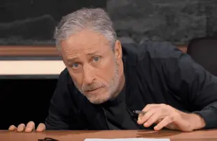 Jon Stewart ducks incoming fire in The Problem With Jon Stewart. (Photo: Apple TV+)