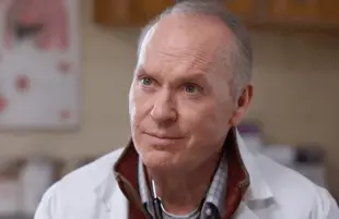 Michael Keaton plays kind-hearted country doctor Samuel Finnix, an unknowing accomplice to Purdue Parma in Dopesick. (Photo: Hulu)