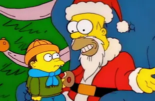 Homer as Santa Claus in The Simpsons (Photo: Disney+)