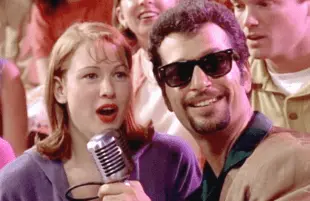 Renee Zellweger and Howie Mandel in Shake, Rattle & Rock.