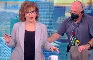 Joy Behar got a helping hand after falling out of her chair Thursday on The View. (ABC)