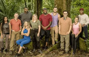 Eboni K. Williams, Craig Morgan, Metta World Peace, Paulina Porizkova (seated), Lauren Alaina, Ray Lewis, Colton Underwood, Mauro Ranallo (host), Jodie Sweetin and Mike Singletary in Beyond the Edge. (Photo: Robert Voets/CBS)