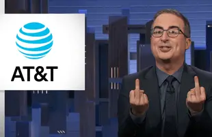 John Oliver flips off AT&T (Photo: HBO)