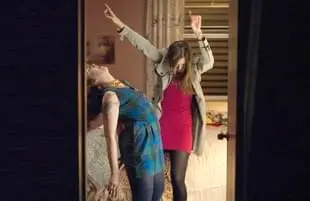 Lena Dunham and Allison Williams bust a move to Robyn's "Dancing on My Own" in Girls. (Photo: Jojo Whilden/HBO)