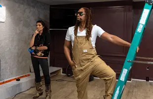 Lil Jon and business partner Anitra Mecadon in Lil Jon Wants To Do What? (Photo: HGTV)