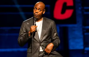Dave Chappelle performing his Netflix special, The Closer (Photo: Mathieu Bitton/Netflix)