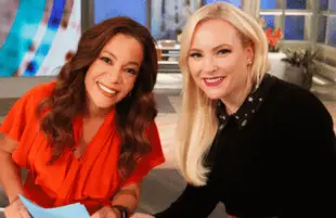 Strange bedfellows: Hostin and McCain on The View set in 2019. (Photo ABC)