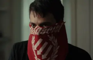 A member of the alternative media collective Unicorn Riot in a scene from Web of Make Believe:. (Photo: Netflix)