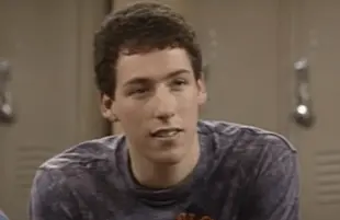 Adam Sandler in a screenshot from The Cosby Show