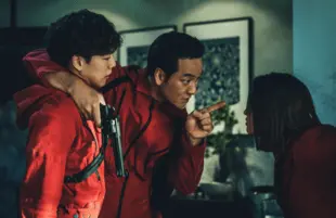 Lee Hyun, Park Hae-soo, and Jun Jong-seo in Money Heist Korea: JEA. (Photo: Jung Jaegu/Netflix)