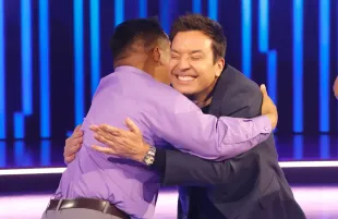 NBC's new Password is suffused with Jimmy Fallon's antic energy, back-slapping man hugs and all. (Photo: Jordin Althaus/NBC)
