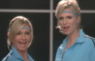Olivia Newton-John and  Jane Lynch in Glee. Photo: Fox/Disney+