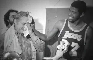 Jerry Buss and Magic Johnson celebrate the Lakers 1980 championship victory in an image from Legacy: The True Story of the LA Lakers. (Photo: Hulu)