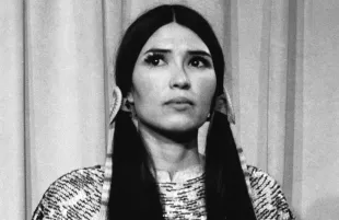 Sacheen Littlefeather onstage at the 1973 Oscars on behalf of The Godfather star Marlon Brando. (Photo: Everett Collection)