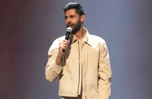 Hasan Minhaj performs at the Brooklyn Academy of Music in The King's Jester. (Photo: Clifton Prescod/Netflix)