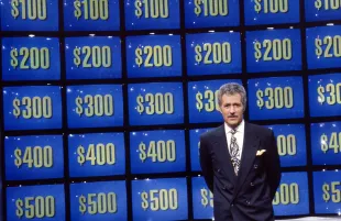 Alex Trebek hosts Jeopardy!. (Photo: Everett Collection)