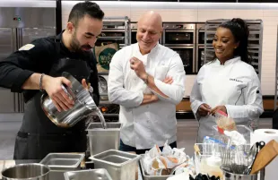 Charbel Hayek, Tom Colicchio, and Lorna Maseko in Top Chef: World All-Stars (Photo: David Moir/Bravo)