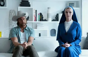 Jake McDorman and Betty Gilpin in Mrs. Davis (Photo: Greg Gayne/Peacock) 