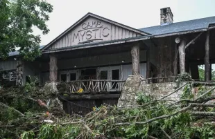 An image of destroyed Camp Mystic housing (Image via Instagram/@katiecouric)
