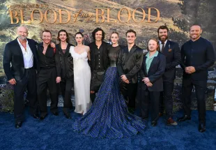 Cast and crew members of Outlander: Blood of my Blood (Image via Getty)