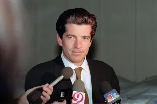 American magazine publisher John F Kennedy Jr  (1960 - 1999) speaks to reporters at the Montgomery County Detention Center, Rockville, Maryland, March 11, 1999. Kennedy was there for a meeting with boxer and convict Mike Tyson. (Photo by Ron Sachs/CNP/Getty Images)