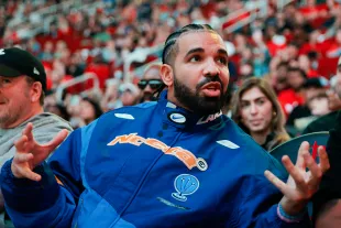 HOUSTON, TEXAS - MARCH 16: Rapper, songwriter, and icon Drake attends a game between the Houston Rockets and the Cleveland Cavaliers at Toyota Center on March 16, 2024 in Houston, Texas (Photo by Carmen Mandato/Getty Images).