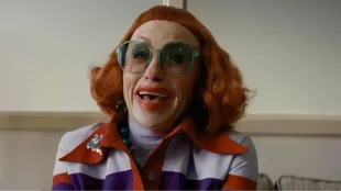 Amy Madigan as Gladys, Alex's supposed "aunt" (Image via Warner Bros)