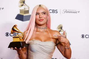 Los Angeles, CA - February 04: Winner Karol G, for "Mañana Será Bonito," with trophy, at the 66th Grammy Awards held at the Crypto.com Arena  in Los Angeles, CA, Sunday, Feb. 4, 2024. (Jason Armond / Los Angeles Times via Getty Images)