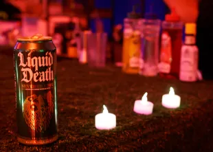 MIAMI, FLORIDA - DECEMBER 08: A detailed view of Liquid Death during Flex Basel Party Presented By Passes And Quantum on December 08, 2023 in Miami, Florida. (Photo by Frazer Harrison/Getty Images for Flex)