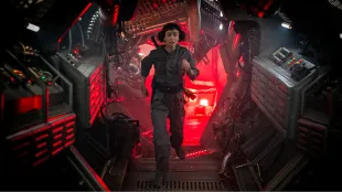 Wendy (Sydney Chandler) sprints through a red-lit corridor during the New Siam recovery in Alien: Earth Episode 3 Metamorphosis.Image Courtesy: FX / Hulu