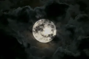 SAN MATEO, CALIFORNIA - SEPTEMBER 18: Full harvest moon rises over San Francisco Bay during cloudy skies in San Mateo, California, United States on September 18, 2024. (Photo by Tayfun Coskun/Anadolu via Getty Images)