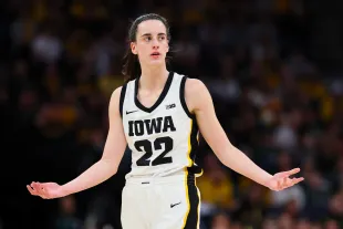 MINNEAPOLIS, MINNESOTA - MARCH 10: Caitlin Clark #22 of the Iowa Hawkeyes reacts in the first half against the Nebraska Cornhuskers during the Big Ten Women's Basketball Tournament Championship at Target Center on March 10, 2024 in Minneapolis, Minnesota. (Photo by Adam Bettcher/Getty Images)