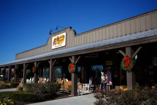 Cracker Barrel defends its redesigned logo, calling it part of a modernization strategy, despite mounting political and cultural controversy.