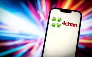 The 4Chan website logo is seen in this photo illustration on 23 November, 2023 in Warsaw, Poland (Image via Getty)