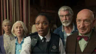 Celia Imrie (Joyce), Helen Mirren (Elizabeth), Naomi Ackie (PC Donna de Freitas), Pierce Brosnan (Ron), and Ben Kingsley (Ibrahim) in The Thursday Murder Club. Image Courtesy of Netflix.