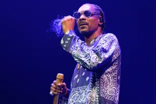 21 September 2023, North Rhine-Westphalia, Cologne: Rapper Snoop Dogg is on stage during a concert at Lanxess Arena. Photo: Henning Kaiser/dpa (Photo by Henning Kaiser/picture alliance via Getty Images)