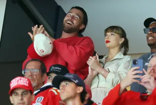 SUNRISE, FLORIDA - JUNE 12: Travis Kelce, left, and Taylor Swift react as the Edmonton Oilers and the Florida Panthers play during the first period in Game Four of the 2025 Stanley Cup Final at Amerant Bank Arena on June 12, 2025 in Sunrise, Florida. (Photo by Bruce Bennett/Getty Images)