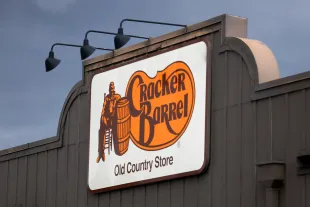 A Cracker Barrel sign featuring the old logo. (Photo by Joe Raedle/Getty Images)