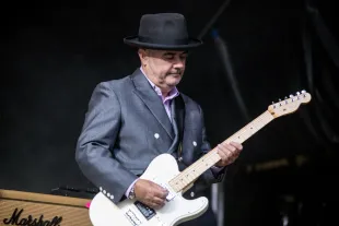 MERTHYR TYDFIL, WALES - AUGUST 19:  Chris Foreman of Madness performs at Cyfarthfa Castle on August 19, 2016 in Merthyr Tydfil, Wales.  (Photo by Mike Lewis Photography/Redferns)