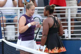 Jelena Ostapenko of Latvia (L) argues with Taylor Townsend of the United States (R) following their Women's Singles Second Round match (Image via Getty)