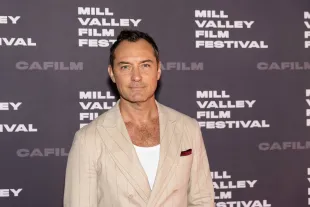 Jude Law discusses his portrayal of Vladimir Putin in Wizard of the Kremlin, addressing controversy and his lack of fear over repercussions.