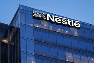 ARLINGTON, VA - May 15, 2025: The corporate logo for the Nestlé food company is seen on the top of their U.S. headquarters building on May 16, 2025, in Arlington, VA. (Photo by J. David Ake/Getty Images)