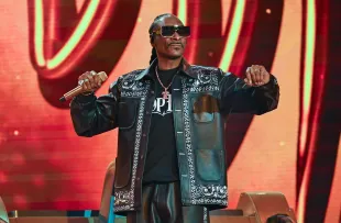 Snoop Dogg is seen performing a surprise concert in Times Square (Image via Getty Images).