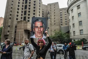NEW YORK, NY - JULY 08: A member of a protest group called "Hot Mess" holds up a sign of Jeffrey Epstein in front of the Metropolitan Correction Center on July 8, 2019 in New York City. According to reports, Epstein will be charged with one count of sex trafficking of minors and one count of conspiracy to engage in sex trafficking of minors. (Photo by Stephanie Keith/Getty Images)